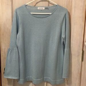 Calvin Klein soft knit with subtle silver metallic yarn , baby blue